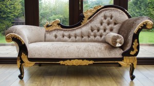 Ornate medium sized chaise longue mahogany frame with gold detailing with mink crushed velvet upholstery