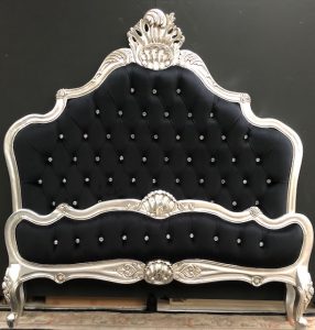A CANNES FRENCH STYLE ORNATE BED IN SILVER LEAF WITH BLACK VELVET AND CRYSTAL BUTTONS